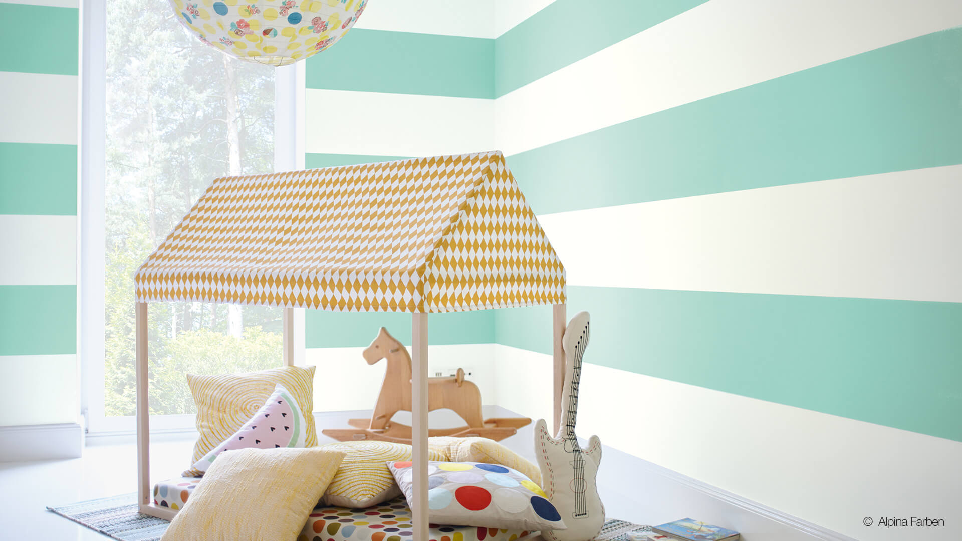 Kinderzimmer gestrichen in der Wandfarbe Farbenfreunde Gekkogrün von Alpina Farben